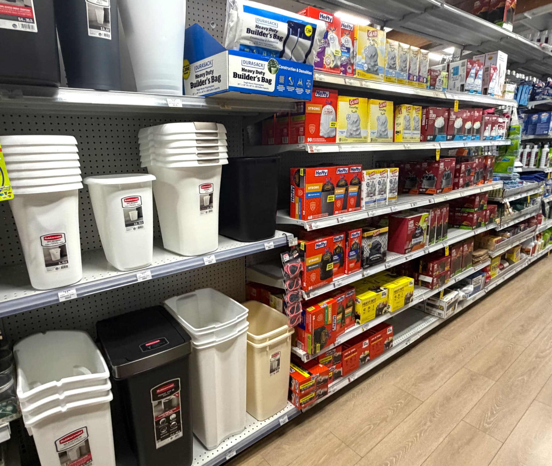 Trash cans, Hefty and Glad trash bags and contractor builder's bags